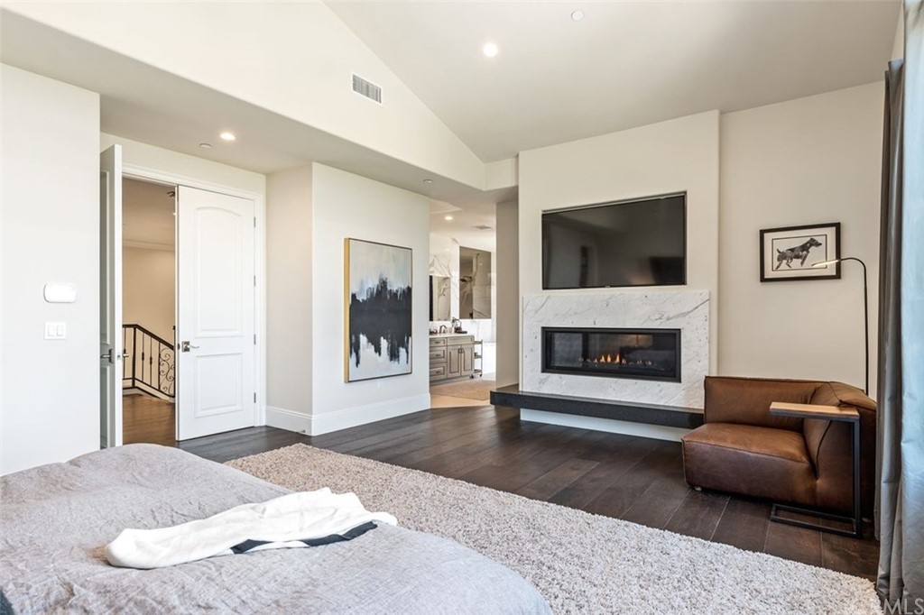 19 Alexa Lane Ladera Ranch, CA 92694 - Photo 21 of 40 a living room with furniture and a fireplace