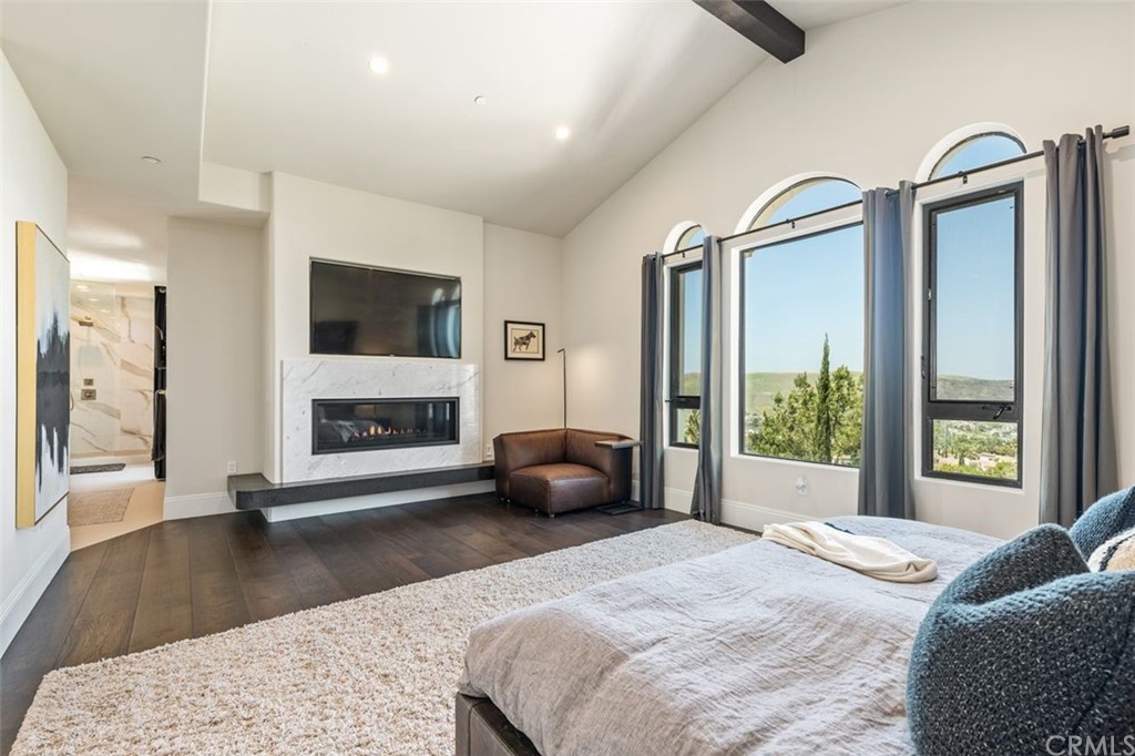 19 Alexa Lane Ladera Ranch, CA 92694 - Photo 22 of 40 a bedroom with a bed and a large window