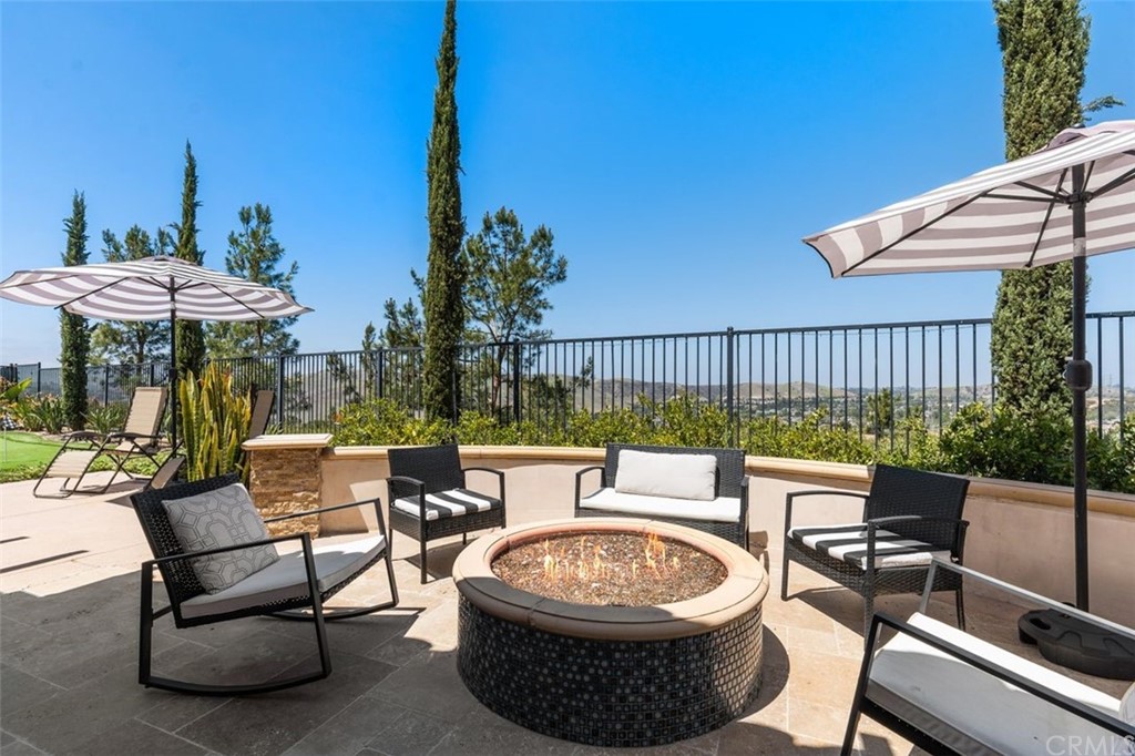 19 Alexa Lane Ladera Ranch, CA 92694 - Photo 5 of 40 a patio with a table and chairs