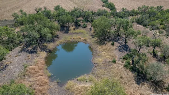 a view of a lake with beach and lake view