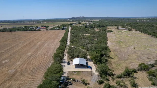 a view of a yard with an outdoor space