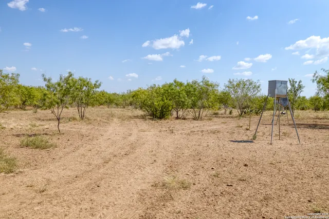 a view of a house with a snow in the yard