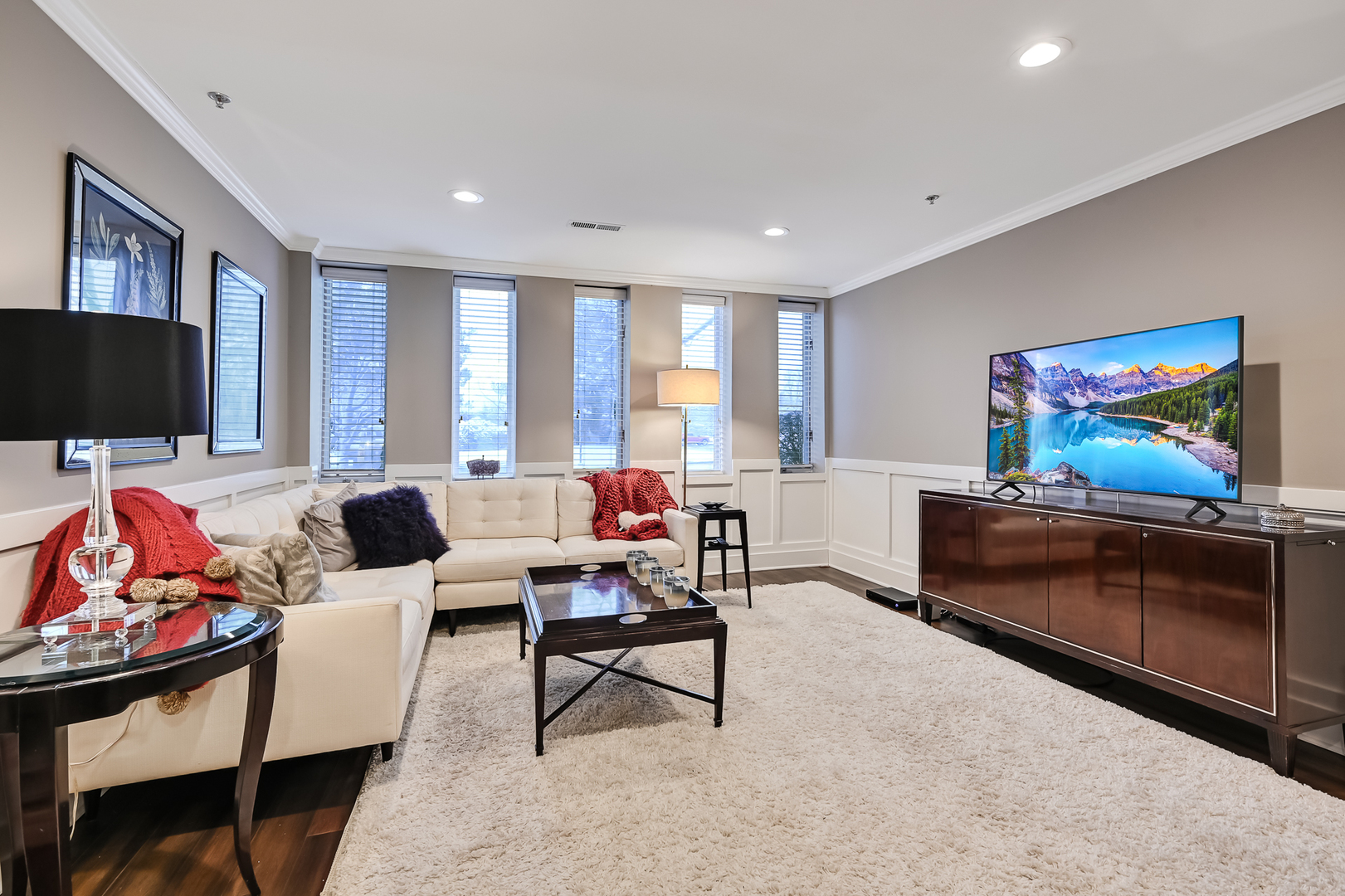 1140 Old Mill Road, Unit 101F Hinsdale, IL 60521 - Photo 8 of 14 a living room with furniture and a flat screen tv