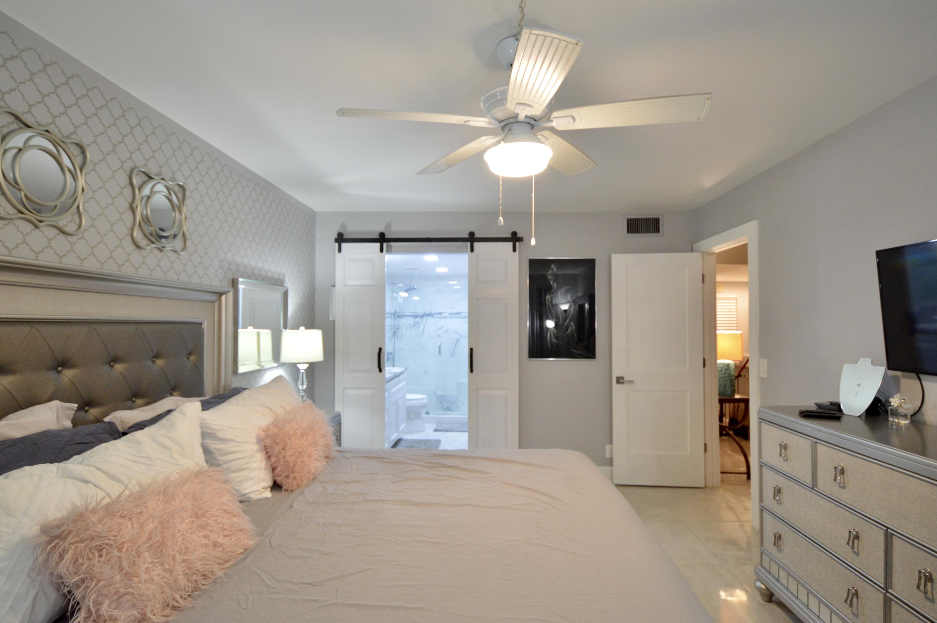 2800 Fiore Way, Unit 109 Delray Beach, FL 33445 - Photo 11 of 16 Master Bedroom