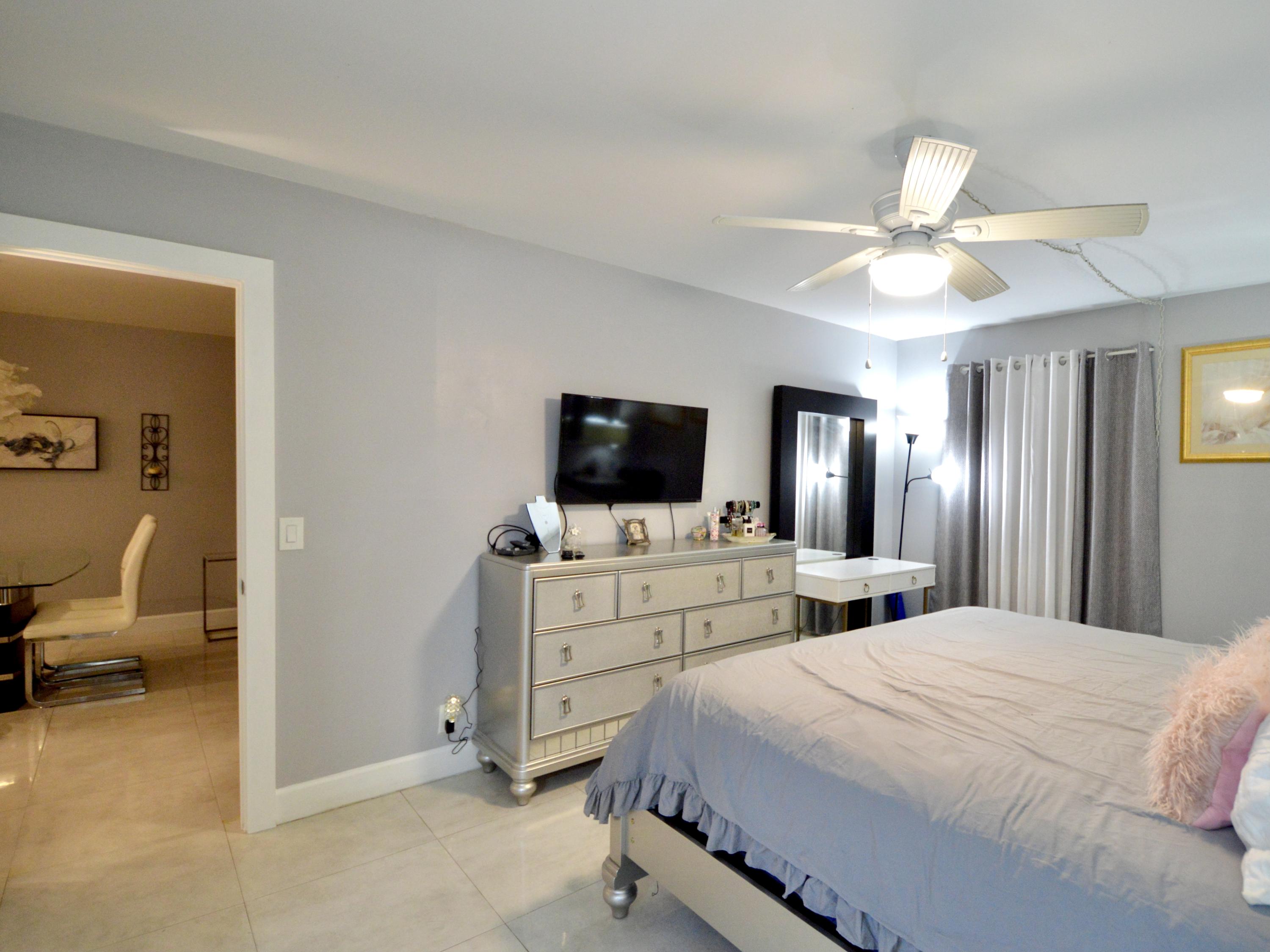 2800 Fiore Way, Unit 109 Delray Beach, FL 33445 - Photo 9 of 16 Master Bedroom