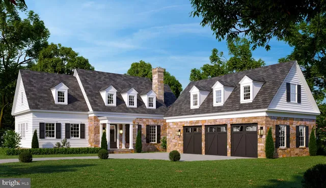 front view of a brick house with a yard
