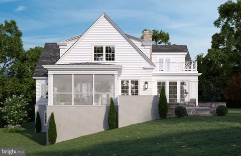 a view of house with yard