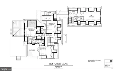 a black and white photo of a living room