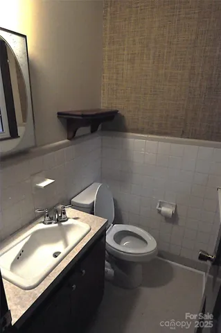 a view of a hallway view with staircase