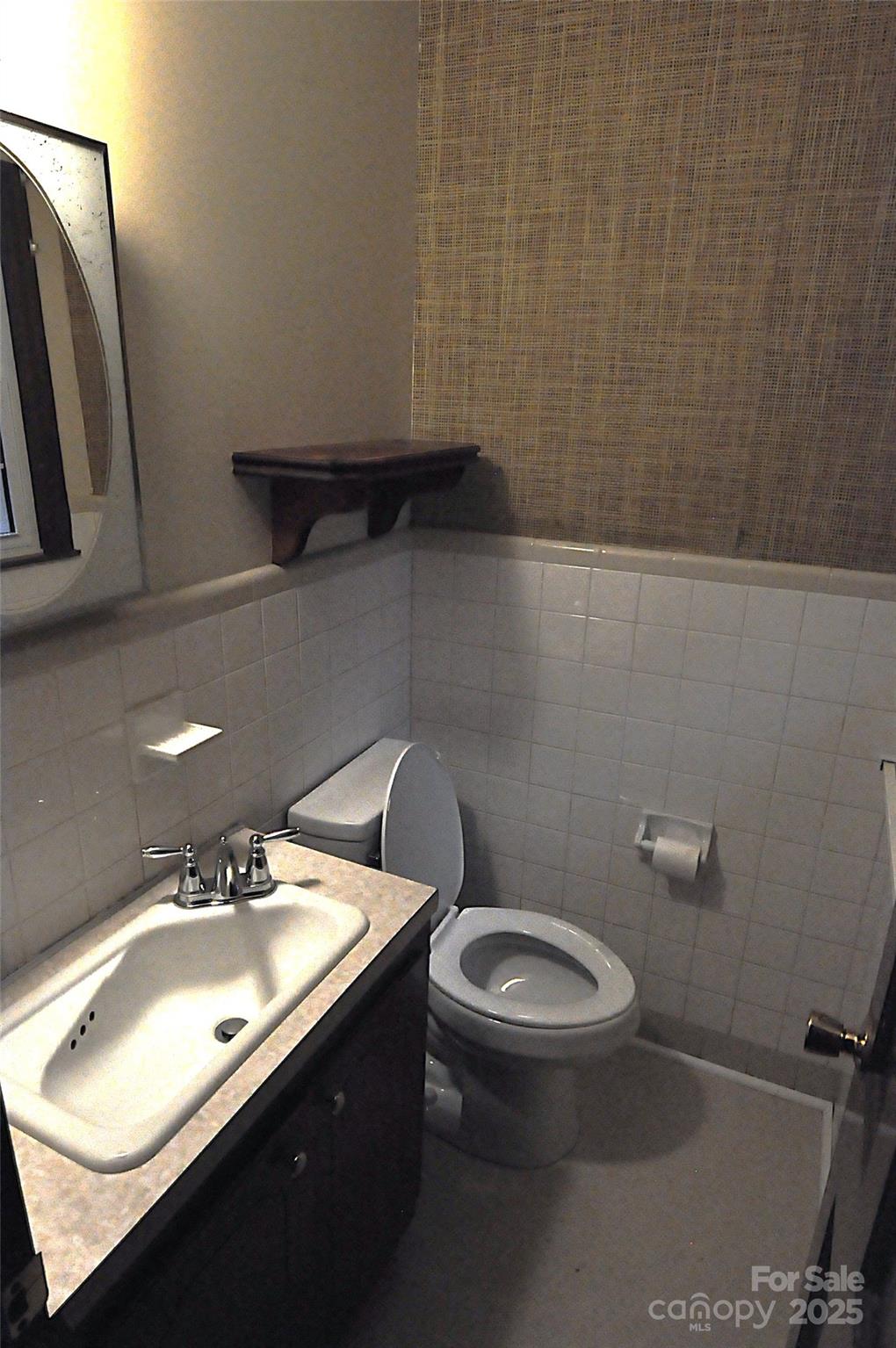 752 Cedar Lane Chester, SC 29706 - Photo 22 of 38 a bathroom with a toilet sink and mirror