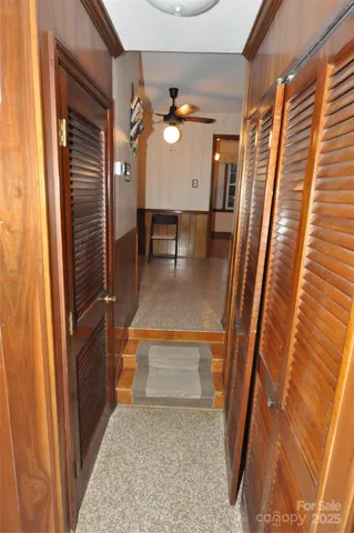 a kitchen with a refrigerator a stove top oven and a sink