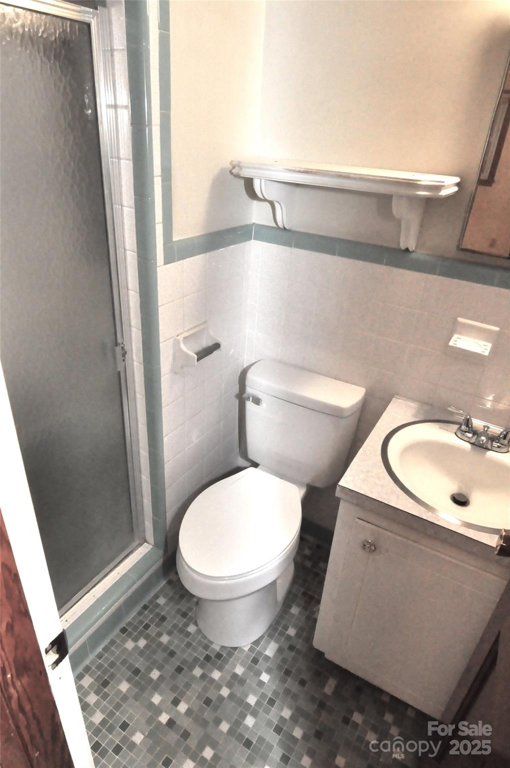 752 Cedar Lane Chester, SC 29706 - Photo 34 of 38 a bathroom with a granite countertop toilet and a sink