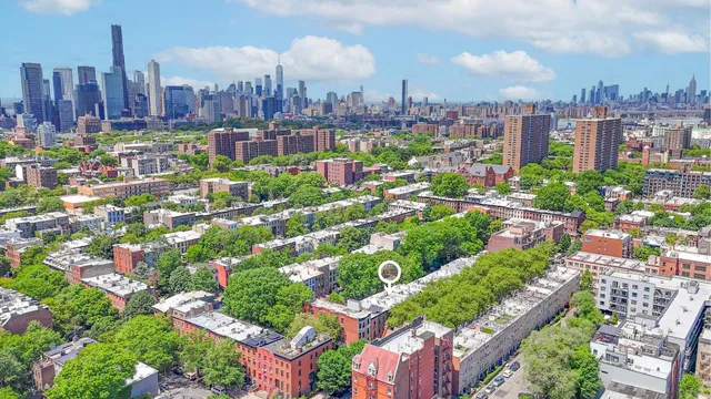 a view of a city with tall buildings