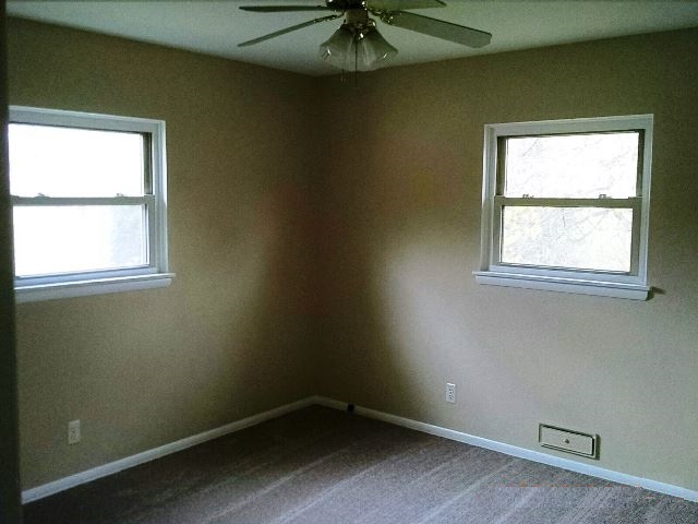 5105 Highcrest Road Rockford, IL 61107 - Photo 6 of 10 an empty room with a window