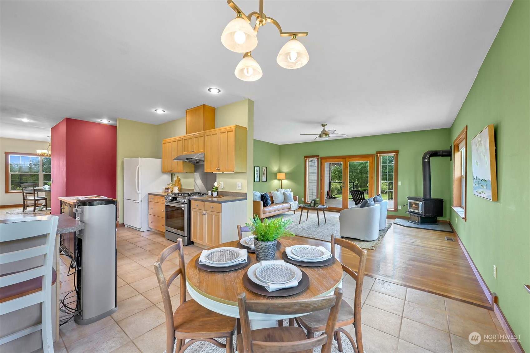 4979 Elder Road Ferndale, WA 98248 - Photo 11 of 24 a dinning area with furniture kitchen view and a large window
