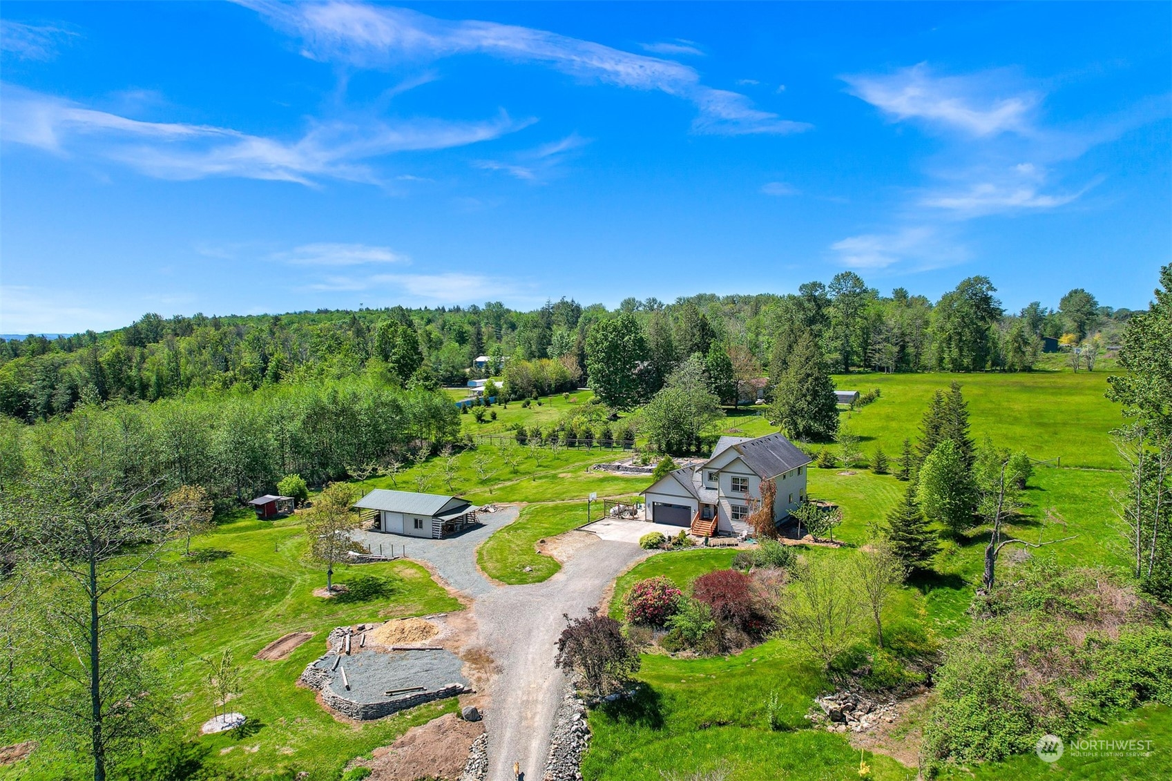 4979 Elder Road Ferndale, WA 98248 - Photo 2 of 24 a view of a lush green forest