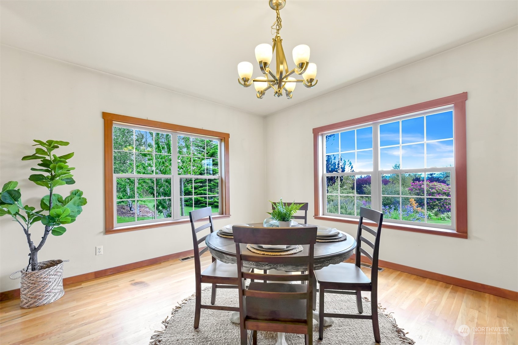 4979 Elder Road Ferndale, WA 98248 - Photo 7 of 24 a view of a dining room with furniture window and wooden floor