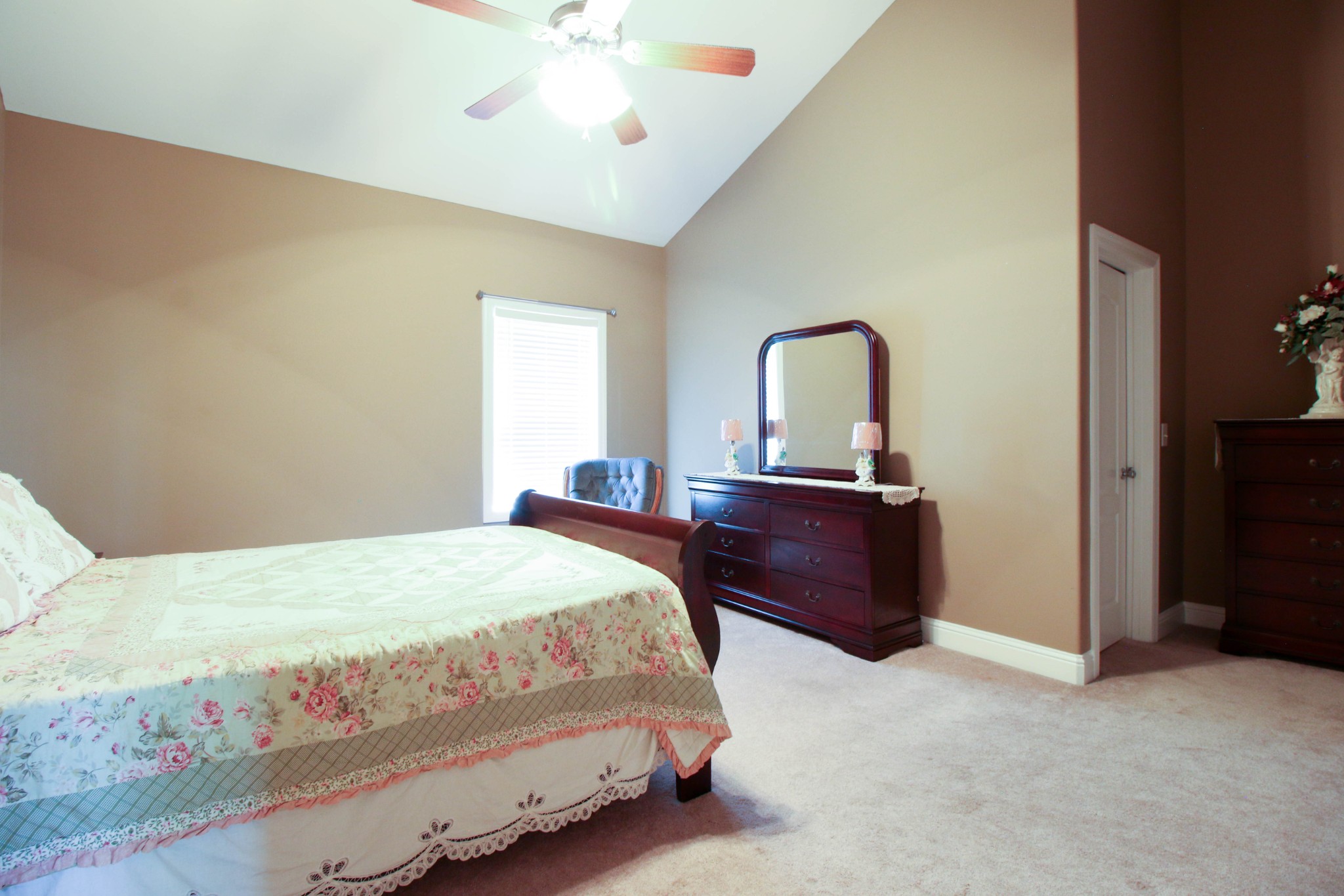 1783 Friendship Road Cross Plains, TN 37049 - Photo 23 of 24 a bedroom with a bed and a chandelier