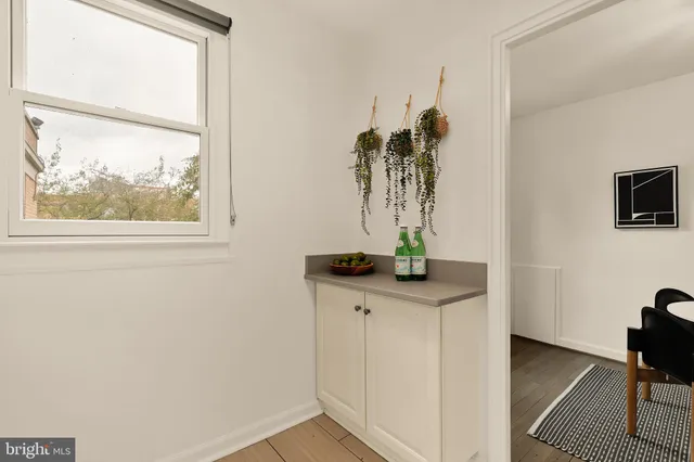 a view of front door and wooden floor