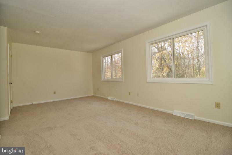 305 Pine Valley Road Dover, DE 19904 - Photo 28 of 37 an empty room with windows