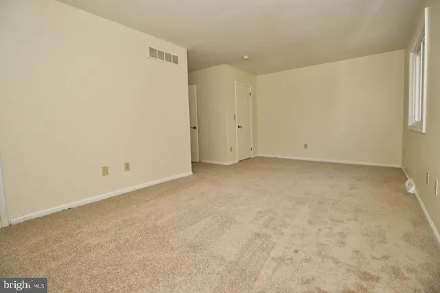 a view of small space with racks on the wall