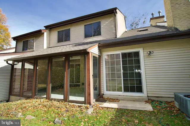 a view of a room with a large window