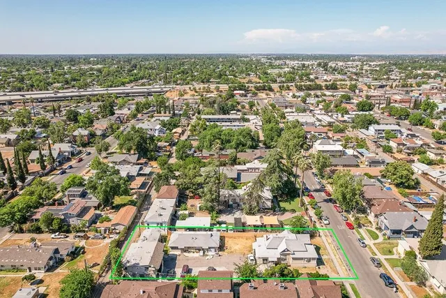 an aerial view of a city with lots of residential buildings