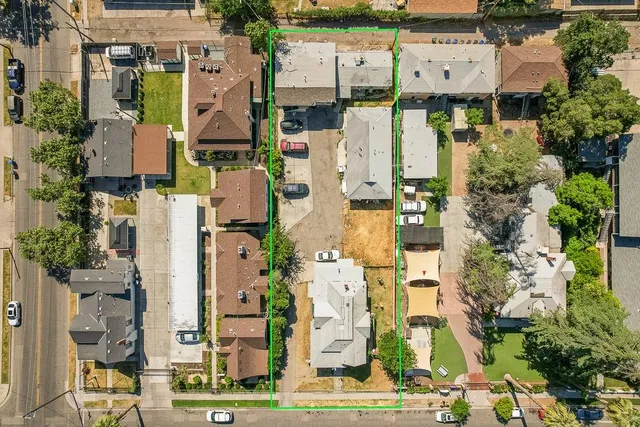 aerial view of residential houses with outdoor space