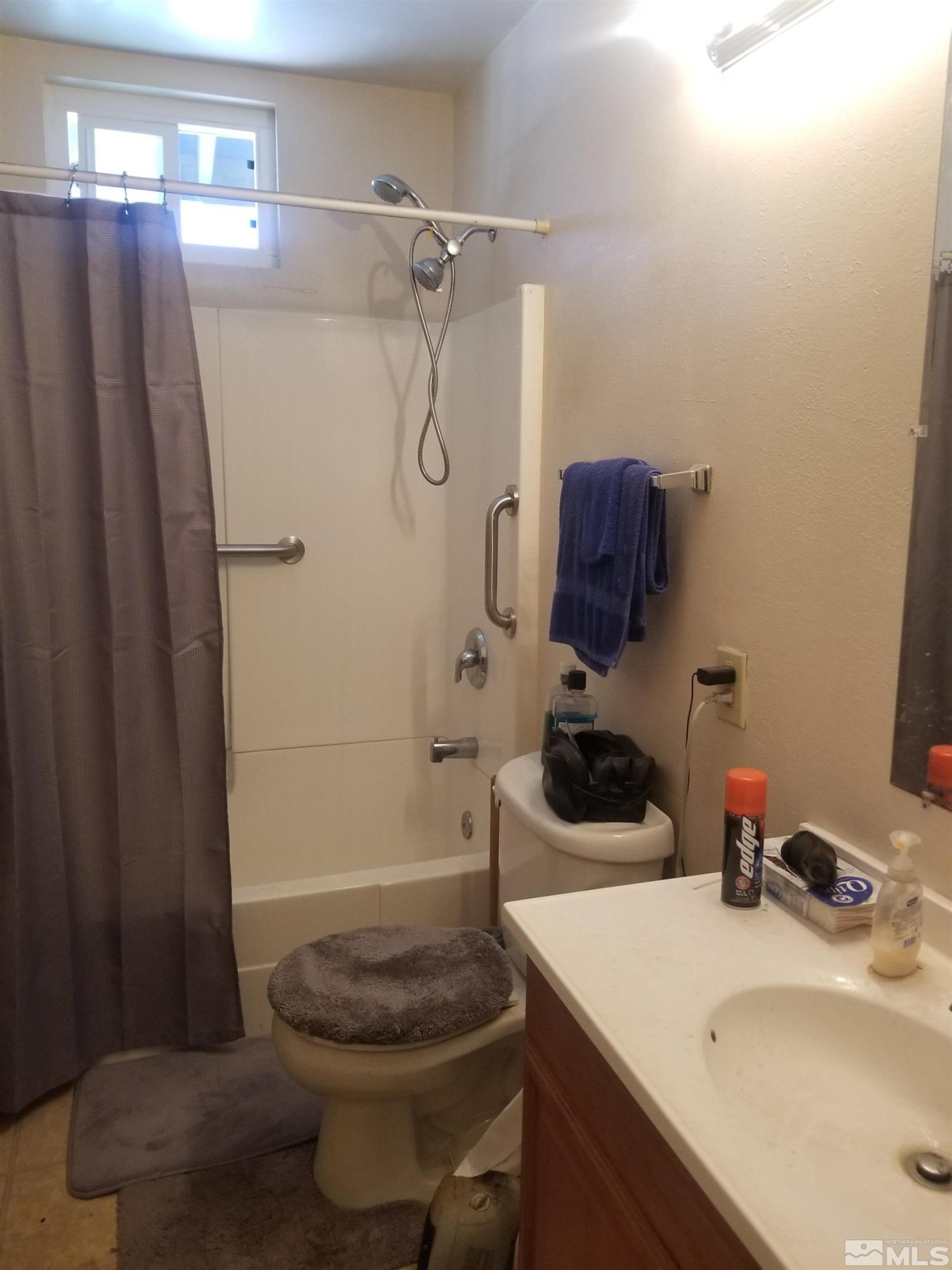 250-252 South Taylor Street Fallon, NV 89406 - Photo 20 of 29 a bathroom with a sink a toilet and shower