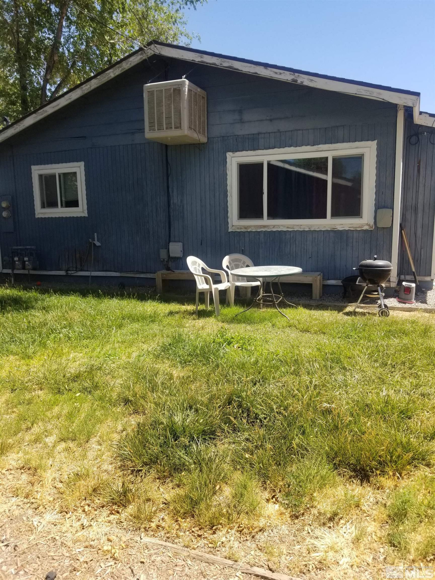 250-252 South Taylor Street Fallon, NV 89406 - Photo 6 of 29 a view of a house with backyard porch and sitting area