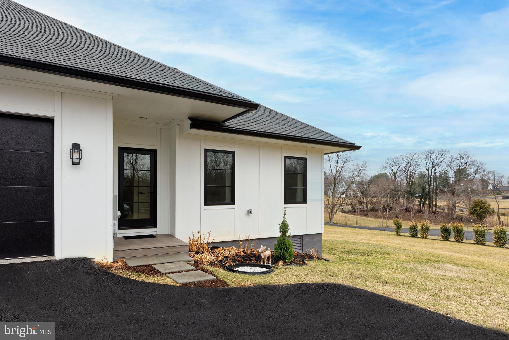 23443 23443-unit A Dover Road Middleburg, VA 20117 - Photo 15 of 41 View of front entrance with parking area