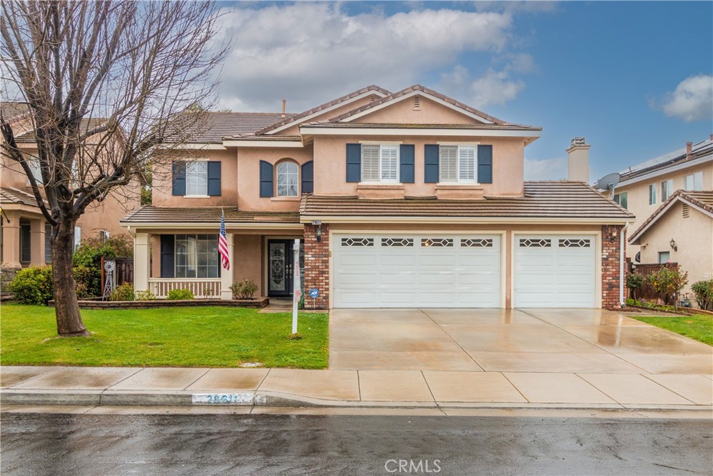 29611 Yorkton Road Murrieta, CA 92563 - Photo 1 of 1 a front view of a house with a yard and garage