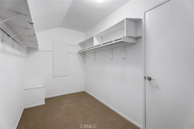 a bathroom with a sink a vanity and a mirror