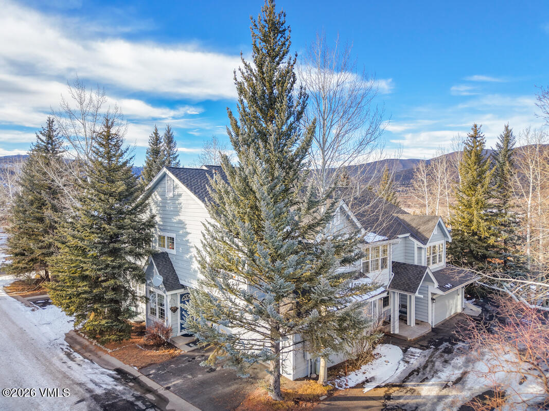 288 Edwards Village Boulevard, Unit 6A Edwards, CO 81632 - Photo 1 of 36 a view of a city with lots of trees