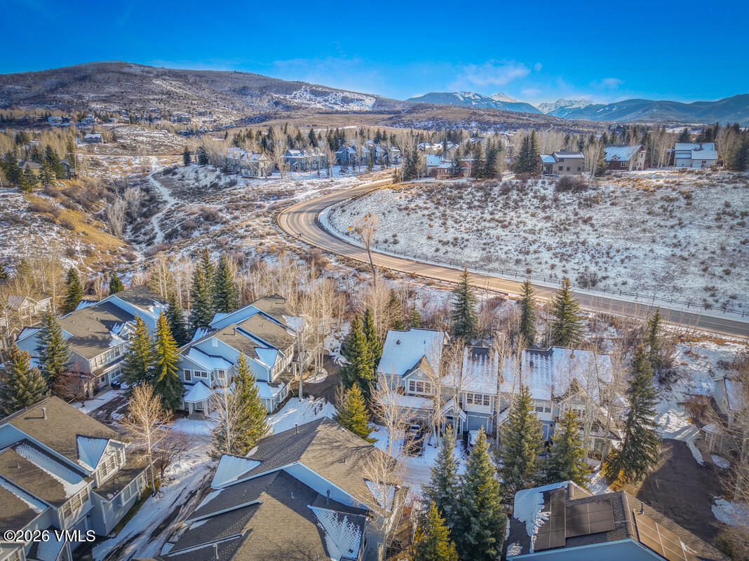 288 Edwards Village Boulevard, Unit 6A Edwards, CO 81632 - Photo 32 of 36 an aerial view of a house with a yard