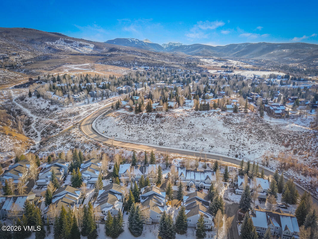 288 Edwards Village Boulevard, Unit 6A Edwards, CO 81632 - Photo 33 of 36 a view of a city with mountains in the background
