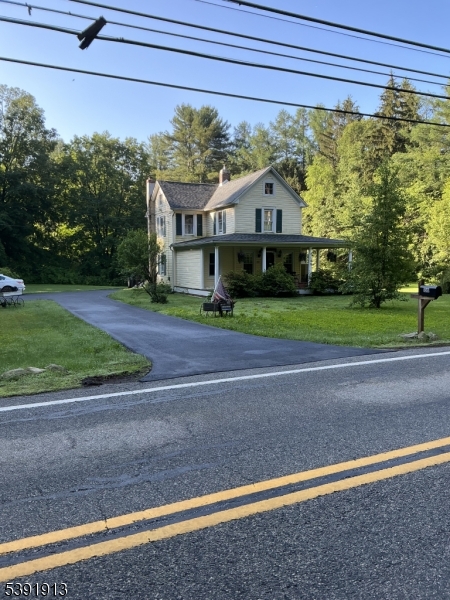 100 La Rue Road West Milford, NJ 07435 - Photo 1 of 13 a view of a house with a street