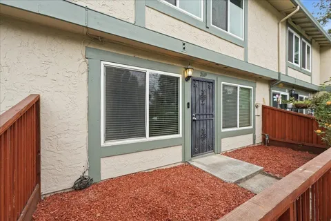 a view of a backyard of a house