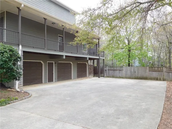 a front view of a house with a garage