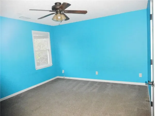 an empty room with closet