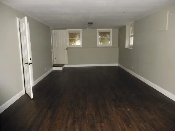 a view of a hallway with a glass door