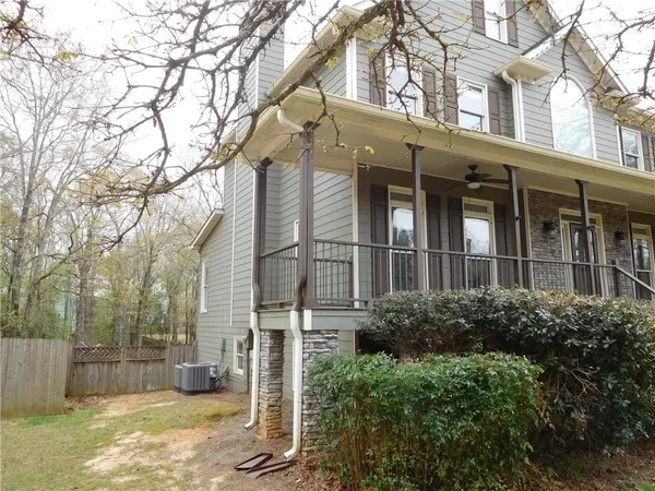 front view of a building with a yard