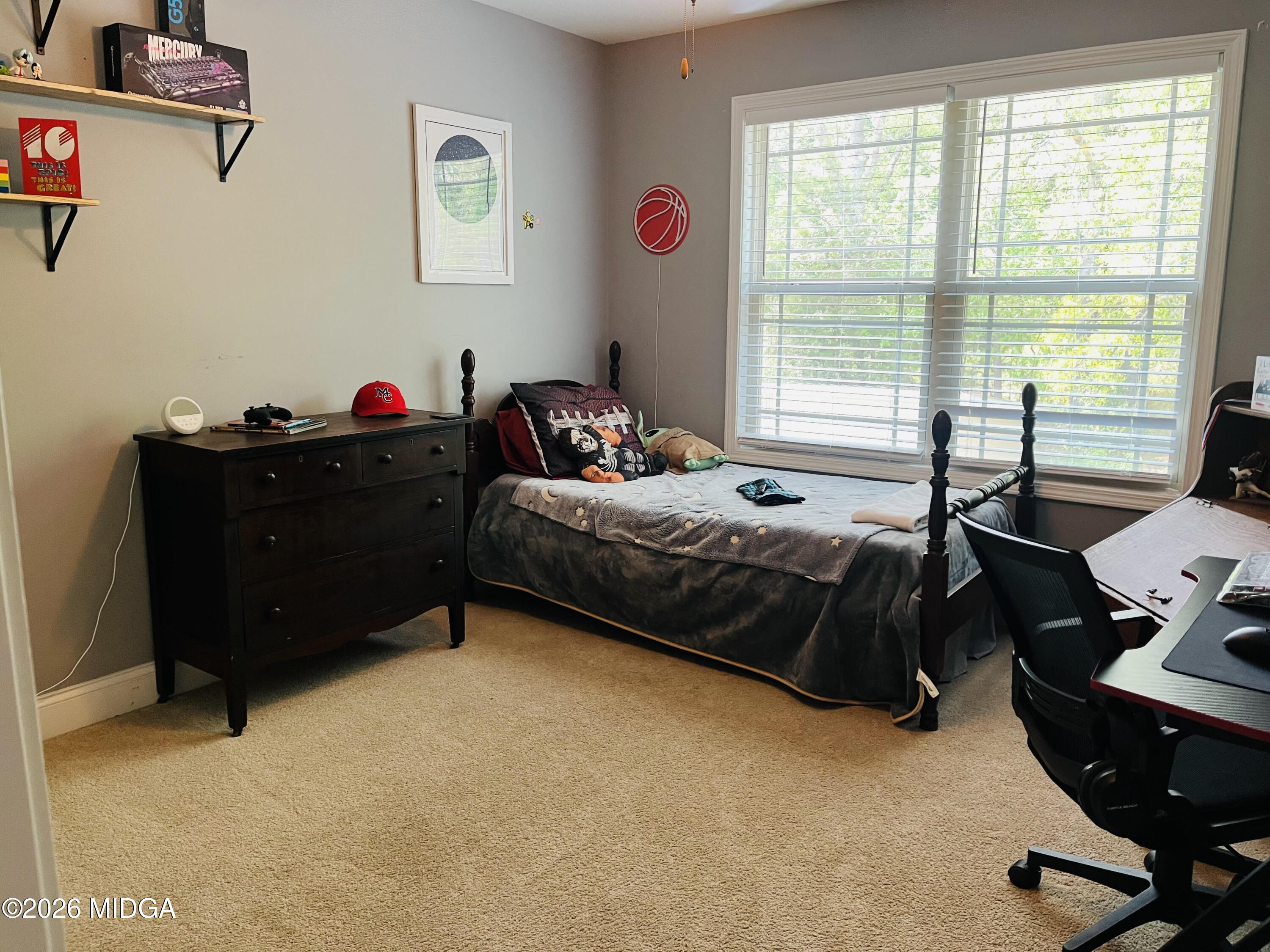121 Presidents Way Forsyth, GA 31029 - Photo 18 of 25 a bedroom with a bed dresser and a window