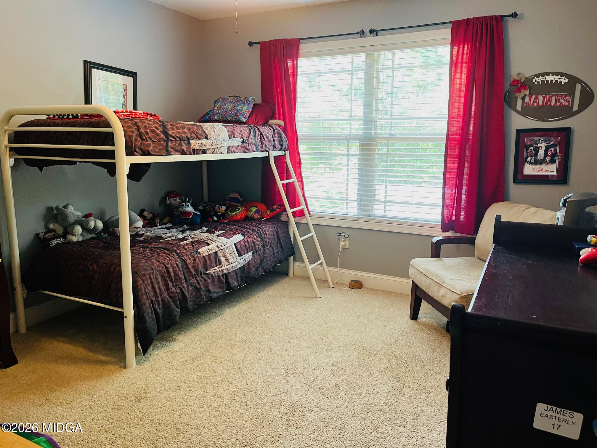 121 Presidents Way Forsyth, GA 31029 - Photo 19 of 25 a bedroom with bed and a window
