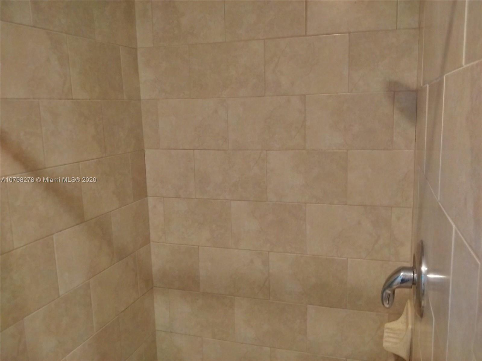 13060 Southwest 263rd Terrace Homestead, FL 33032 - Photo 13 of 28 a bathroom with a shower