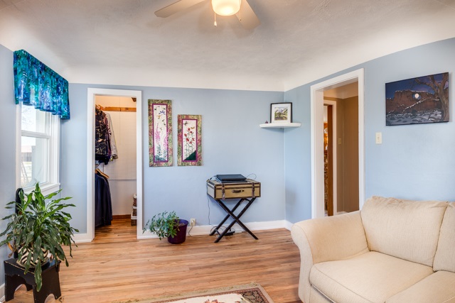 2074 K Road Fruita, CO 81521 - Photo 17 of 28 a living room with furniture and wooden floor