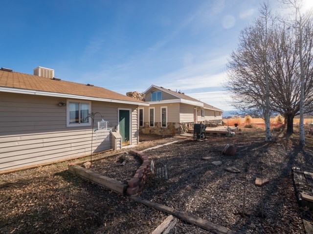 2074 K Road Fruita, CO 81521 - Photo 28 of 28 a front view of a house with a yard