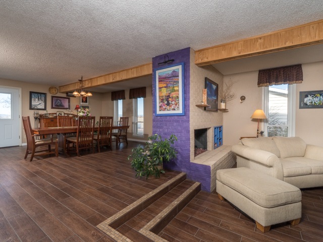 2074 K Road Fruita, CO 81521 - Photo 5 of 28 a living room with furniture and a fireplace
