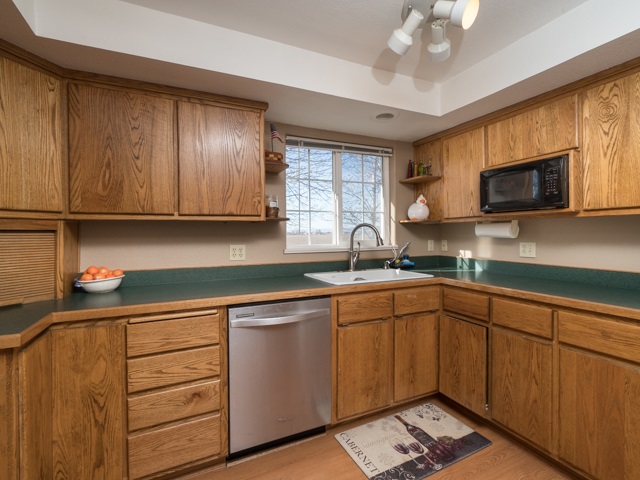 2074 K Road Fruita, CO 81521 - Photo 8 of 28 a kitchen with a sink cabinets and window