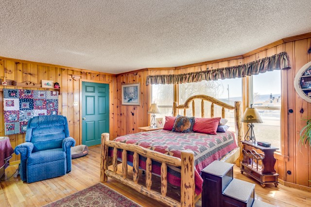 2074 K Road Fruita, CO 81521 - Photo 10 of 28 a bedroom with furniture and a large window